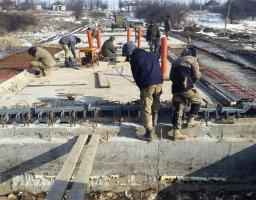 Ремонт Троїцького мосту йде прискореними темпами